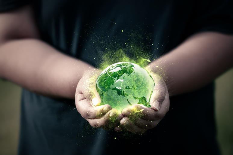 https://www.irisbusiness.com/wp-content/uploads/2024/02/two-hands-hold-green-globe-magic-light-concept-saving-world-earth-day.jpg